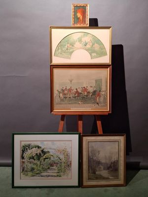 two framed pictures of a painting and a picture of a painting on a easel