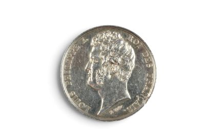 an image of a coin on a white surface