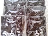 four bags of chocolate sitting on top of a table