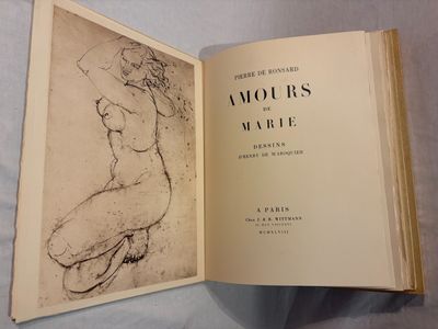 un livre ouvert sur lequel figure le dessin d'un nu