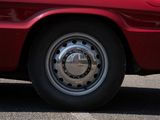 a red car that is parked in the parking lot
