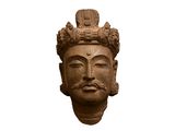 l'image d'une statue d'un homme avec une couronne sur la tête