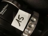 a close up of a camera with a tag on it