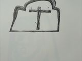 pencil drawing of a cross on a piece of paper with a pencil