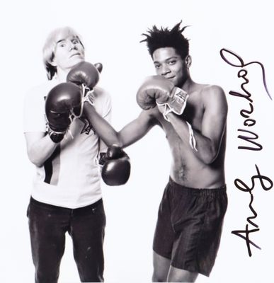 signed photograph of two young men with boxing gloves on each of them
