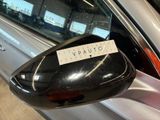 a sticker on the side mirror of a car that says veauuto