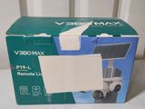 a box with a remote on it sitting on a table