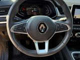 the interior of a car with a steering wheel, dashboard, and dash board