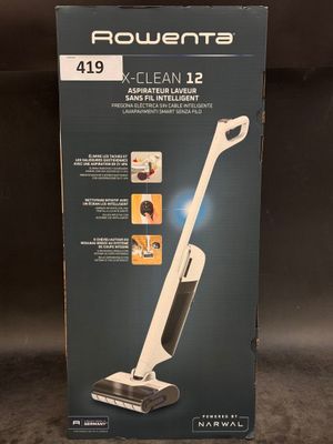 a box of a vacuum cleaner sitting on top of a table
