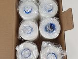 six rolls of toilet paper wrapped in plastic wrap