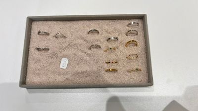 a box with a bunch of different rings in it