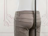 the back view of a mannequin wearing a pair of jeans