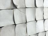 a stack of toilet paper stacked on top of each other