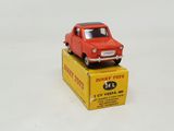 a red toy car sitting on top of a yellow box