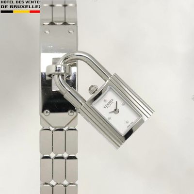 a silver watch with a padlock attached to it