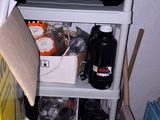 a shelf that has a lot of items on it