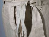 a close up of a mannequin torso with a belt around it