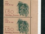 two stamps with a picture of a man and a woman on them
