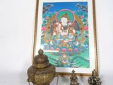 une image représentant un Bouddha accrochée au mur