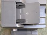 an overhead view of a printer sitting on top of a table