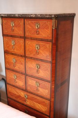 an image of a chest of drawers in a bedroom