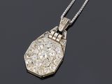a diamond set pendant on a chain