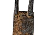 an image of an old cell phone with two horns sticking out of it ' s back