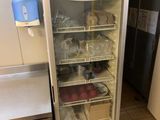 a refrigerator that has a lot of food inside of it