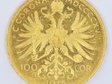 une image représentant une pièce d'or sur laquelle figure un aigle à deux têtes