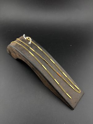 a close up of a hair clip on a black surface