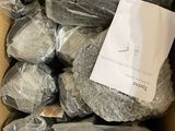a box full of stuffed animals wrapped in plastic