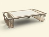 une table basse avec un plateau en verre posée sur un piètement blanc