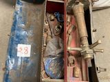 a box with tools inside of it on the floor