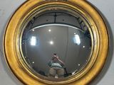 a man taking a picture of himself in a mirror