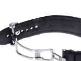 a black leather strap with a silver buckle on it