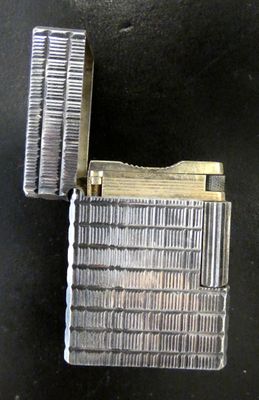 a lighter that is sitting on top of a table