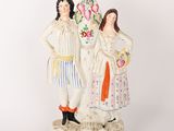 deux figurines placées l'une à côté de l'autre
