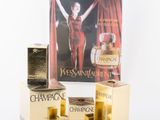 two boxes of champagne and a box of perfume on a white background