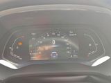 a car dashboard with a speedometer and a dash light