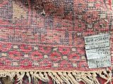 a close up of a piece of cloth with a tag on it
