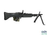 un pistolet-jouet muni d'une mitrailleuse fixée sur le côté