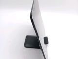 a close up view of a cell phone on a stand