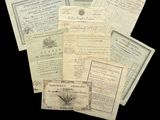 an image of a pile of old papers on a black background