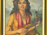 tableau représentant une femme avec une guitare, dans un cadre doré