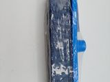 a plastic mop with a blue handle on a white surface