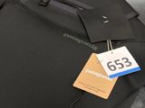 a close up of a wetsuit with a tag on it