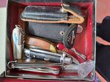 a red box with a bunch of tools inside of it