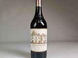 a bottle of wine that is sitting on a table
