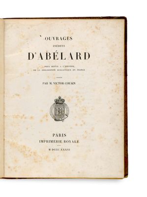 an open book with a picture of a coat of arms on it