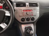 a dashboard of a car with a clock on it